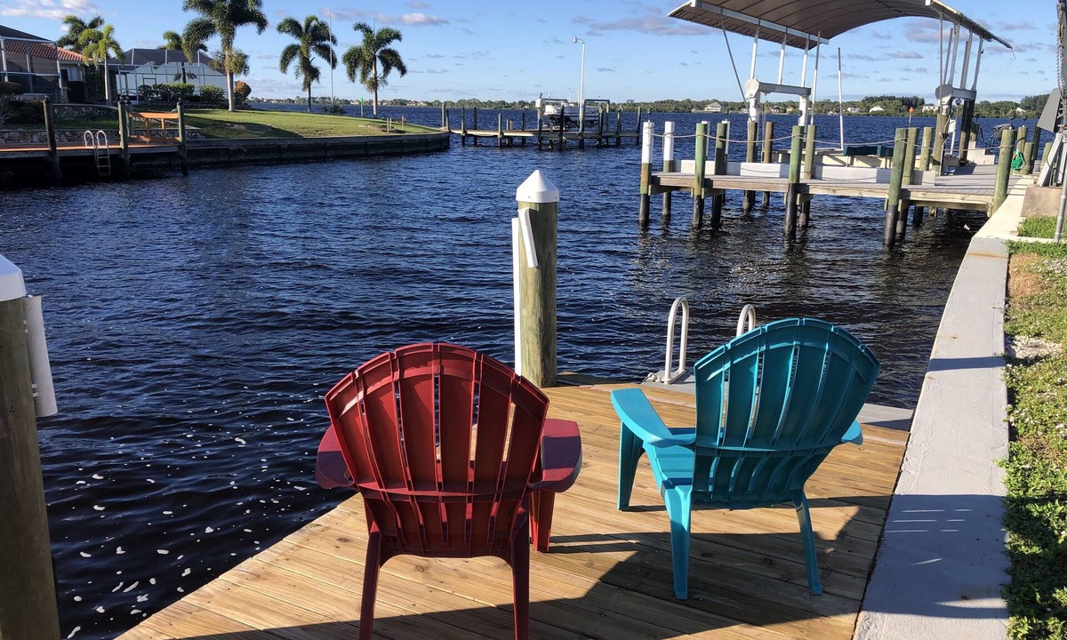 Gardens of Gulf Cove House | Breath taking canal, pool home with golf access. 15 minutes from beaches.