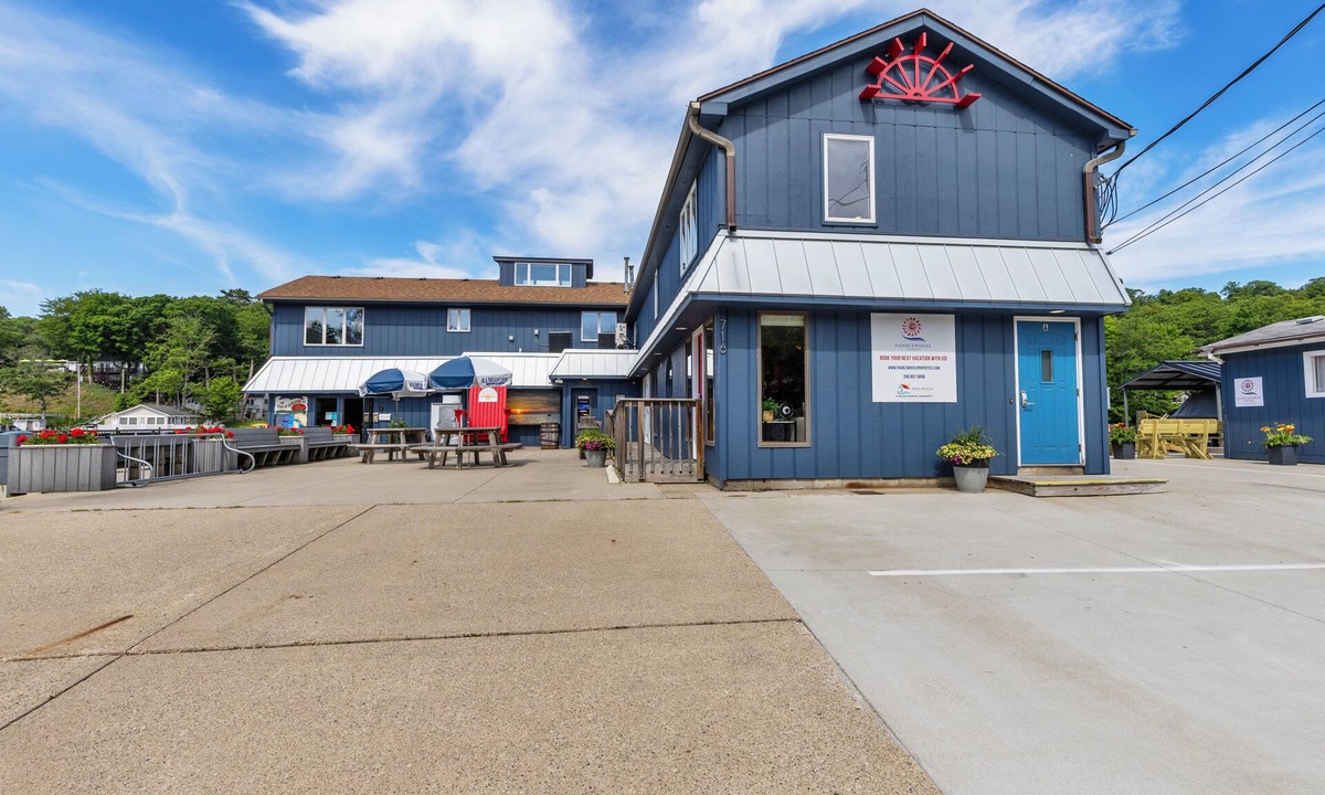 Saugatuck Apartment | Gorgeous Downtown Penthouse with 40' Waterfront Deck Overlooking Kalamazoo River & Mt. Baldhead! 3BR 2BA (Upper Level Unit)