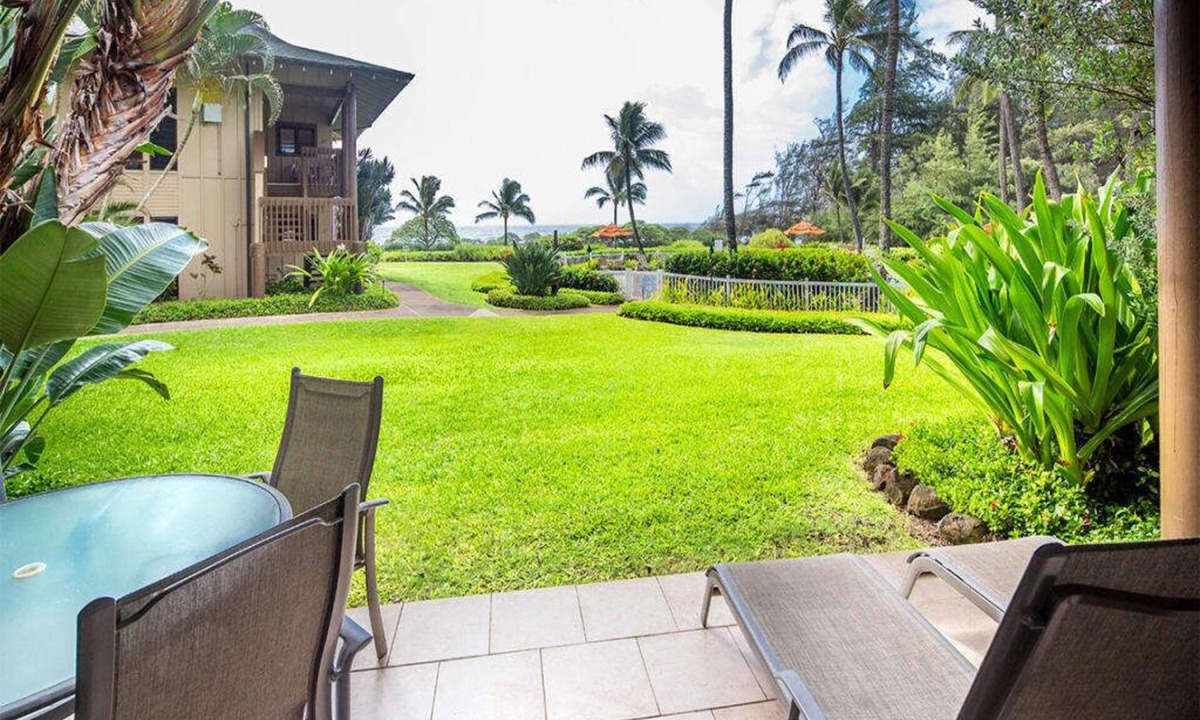 Lihue Condo | Lanai to Lawn! Chic Kitchen+Bath, Ceiling Fans, WiFi, Tile Floors–Kaha Lani 110