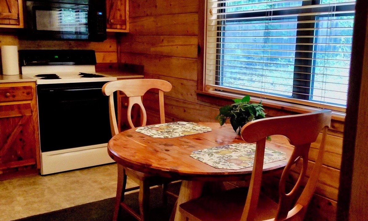 Eureka Springs Cabin | Secluded Hideaway Cabin boasting Wrap-Around Deck and Jacuzzi for two! Trail & Cave on property!