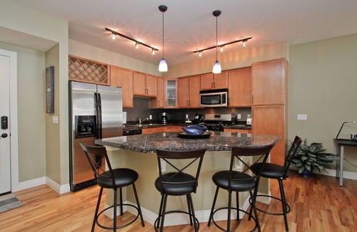 Jefferson Park Condo | All new furniture, heated garage, newer building location makes this a MUST!