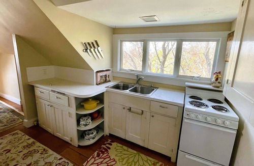 Easton's Point Apartment | Charming treetop apartment with ocean views & short walk to the beach