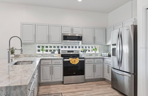 Sunset Lakes House | Disney World, Universal Epic Waterfront Modern Home - Private Pool And Game Room