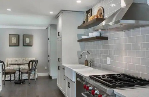 Saugatuck House | Dogwood Creek-Cozy in-town cottage with incredible deck, gardens, pool, sauna