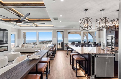 Yaupon Beach House | Experience luxury at 'How Suite It Is'—14-bedroom oceanfront retreat in Oak Island!