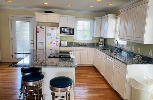 Holden Beach House | Experience oceanfront luxury at Sweet Dreams, a spacious 4BR retreat in Holden Beach.