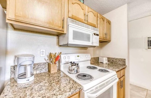 Maunaloa Apartment | Garden-View Molokai Condo with Lanai, Pool & Walk to Beach