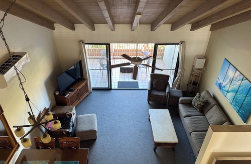 Kihei Condo | Great for families and couples. Next to a tropical pool in Hawaiian landscape.