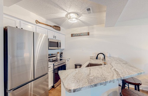 Sea Trail Condo | Ground-floor condo with patio, hot tub, in/outdoor pools, gym, washer/dryer, AC