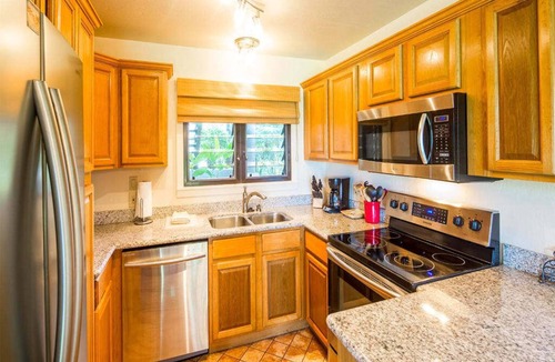 Lihue Condo | Hawaii Style w/Lawn off Lanai, Full Kitchen, WiFi, Ceiling Fans, DVD–Kaha Lani 111