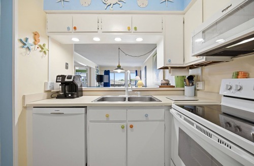 Atlantic Beach Condo | It's Beach Time at A Place at the Beach waterpark resort. This 2-bedroom, 2-bathroom condo offers fun accommodations overlooking the waterslide & pools. On-site you'll find mini-golf, tennis, beach access and SO MUCH MORE!