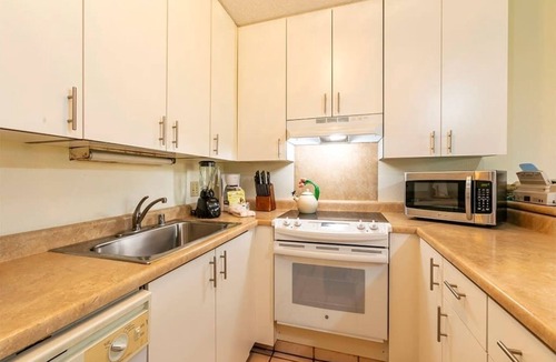 Kihei Condo | Lanai to Lawn Steps from the Beach! Kitchen Ease, WiFi, AC–Kamaole Sands 10112