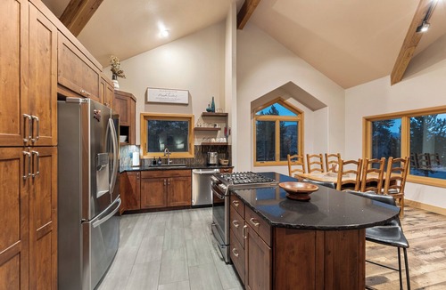 Three Peaks House | Private Wooded Setting with Open-Concept Layout and Updated Kitchen