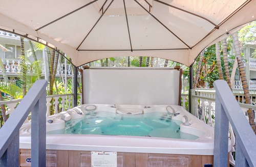 Historic Kailua Village Condo | Remodeled & private studio with WiFi, balcony, & shared pool/hot tub/gas grills
