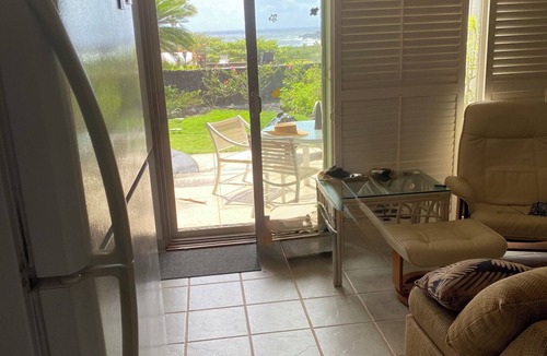 Punaluu Condo | Secluded , cozy poolside getaway. Ocean views, near black sand beach & turtles.