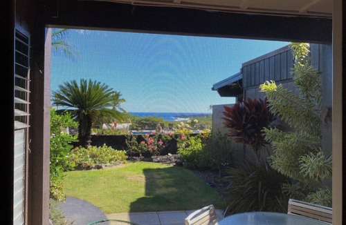 Punaluu Condo | Secluded , cozy poolside getaway. Ocean views, near black sand beach & turtles.
