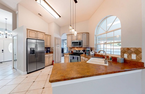 Sunridge Woods House | Spectacular home with pool, grill, & full kitchen - dog-friendly