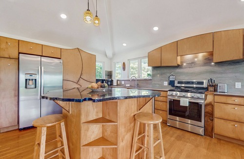 Princeville House | Stunning home , AC, Mtn &waterfall views, 86"TV, walk to beach & golf