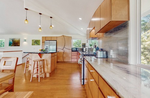 Princeville House | Stunning home , AC, Mtn &waterfall views, 86"TV, walk to beach & golf