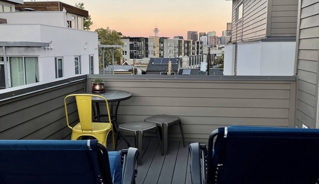 2 bedroom townhome w fire place & rooftop deck.