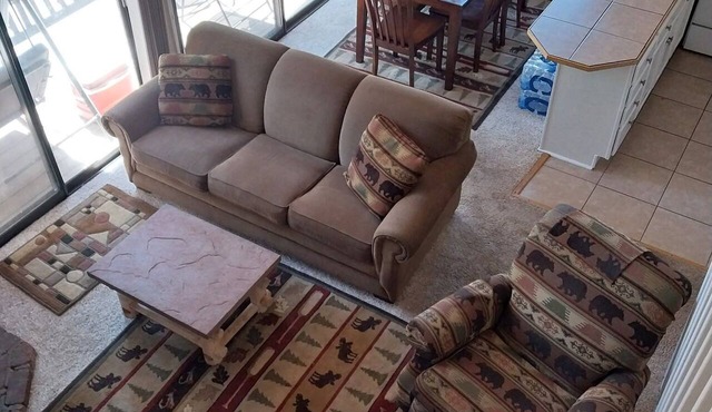 2Bdrm 2Ba + Loft w 3 beds Top fl end unit wall of windows lg balcony over creek