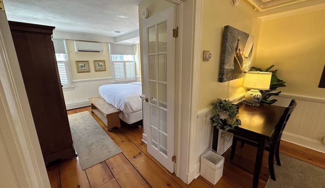 Get ready for downtown Newport RI bliss in this airy three-room suite at 205 Spring St! King bed + pull-out sofa & daybed, ensuite bath, living area, AC, highs speed Wifi, TV, mini fridge, coffee station. Steps to Thames Street, shops, wharfs
