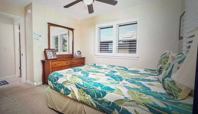 Kona Bliss. Immerse yourself in tropical tranquility. Short walk to beach.