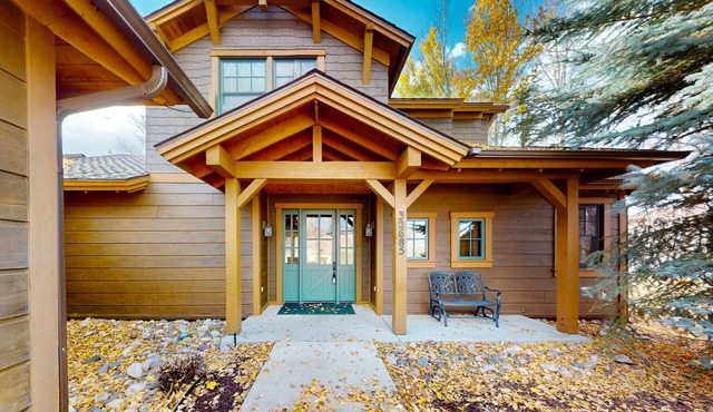Lakefront home with a private dock, balcony, grill, gas fireplace, W/D, and AC