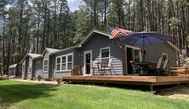 Peace and privacy await among the towering Pine Trees.