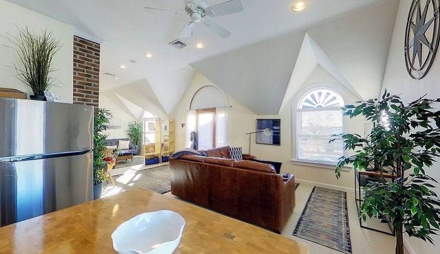 Unwind in harbor luxury at this sophisticated studio in Newport's Yachting Village! Cozy queen bed + pull-out sofa bed, fully stocked kitchen, huge deck with sunset harbor views, mini-split AC, TV, off-street parking. Steps to marinas, Thames Street