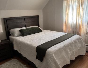 Queen Room with Shared Bathroom