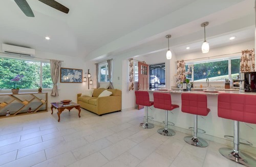 Pauwela Apartment | Bright Haiku Studio: Patio + Rainforest View