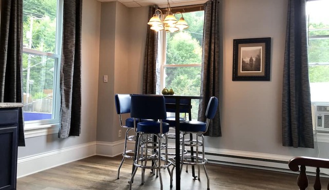 Upscale King Suite with Purple Mattress and reserved off-street parking